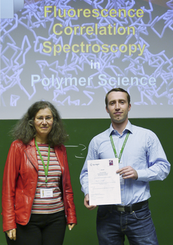 The conference organiser Prof. Christiane Papadakis and David Schäffel during the award ceremony