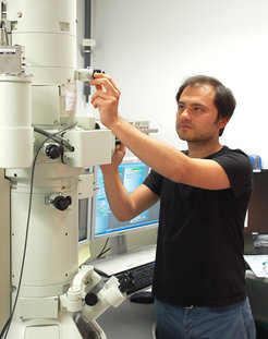 Samet Varol conducts measurement with a Transmission electron microscope (TEM)