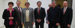 v.l.n.r.: Prof. Dr. Katharina Landfester (MPI-P), Univ.-Prof. Dr. Stephan Grabbe (Hautklinik, Unimedizin), Prof. Dr. Rudolf Zentel (Organische Chemie, JGU), Univ.-Prof. Dr. Volker Mailänder (Hautklinik, Unimedizin), Prof. Ferry A. Ossendorp (Leiden University Medical Center, Niederlande), Dr. Peter Wick (EMPA, St. Gallen, Schweiz). Im Hintergrund: Prof. Kenneth B. Wagener (University of Florida, USA)