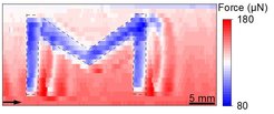 Figure 3: Using a shadow mask, we made an M-shaped pattern in the surface of high (outside the "M") and low contact angle hysteresis (inside the "M"). By means of DoFFI it is possible to localize and visualize the "M".